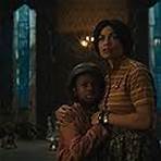 Rosario Dawson and Chase Dillon in Haunted Mansion (2023)
