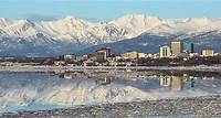 Skyline of Anchorage, Alaska with Glaciers in the Background Planning a Trip To Alaska: Land vs. Sea | Royal Caribbean Cruises When planning a trip to Alaska, many travelers wonder if it's better to explore the state by land or by sea. Here's why travel by cruise ship is best here.