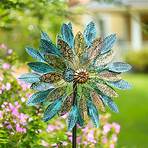 Metal Wind Spinner with Patina-Like Blue, Golden and Bronze-Colored Leaves with Intricate Filigree Cutouts | Wind and Weather