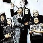 Christina Ricci, Raul Julia, Christopher Lloyd, Anjelica Huston, Christopher Hart, Judith Malina, Carel Struycken, and Jimmy Workman in The Addams Family (1991)