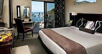 5. Aurora Hotel Charming boutique hotel with friendly staff, cozy rooms & modern amenities. Nearby restaurants & beach. Featuring a rooftop deck with city & harbor views, and private terrace for relaxation.