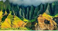 An exotic green mountainside with the peaks hidden by clouds on the coastline of Kauai, Hawaii The Culture of Hawaii: History & Folklore What is Hawaii's historical background? Who was Hawaii’s First King? Enjoy a tour guide tailored to you on the culture of Hawaii & its island folklores.
