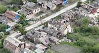 Drone footage shows Ukrainian village battered to ruins as residents flee Russian advance
