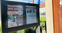 Öffentliches Infodisplay für Flörsheim-Dalsheim Digitale Bekanntmachungstafel am Bahnhof informiert Bürger und Touristen über Veranstaltungen und Nachrichten