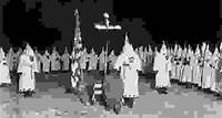 A Ku Klux Klan initiation ceremony, 1920s.