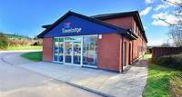 9. Travelodge Aberdeen Bucksburn Quiet, peaceful hotel offering comfortable beds for a good night's sleep. Friendly staff and clean rooms, near airport, supermarket, and dining options.