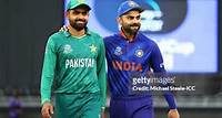 Babar Azam of Pakistan and Virat Kohli of India interact ahead of the ICC Men's T20 World Cup match between India and Pakistan at Dubai International