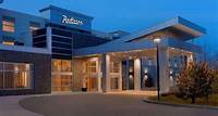 Best Seller This is one of the most booked hotels in Calgary over the last 60 days. 8. Radisson Hotel & Conference Centre Calgary Airport Visually appealing lobby, conveniently located in industrial area. Amenities include shuttle service, heated floors, pool, gym, and airport proximity.