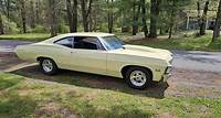 1967 Chevy Impala. Very good condition. No rust. 427 big block, after market fiberglass cowl hood. T
