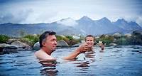 Enjoy the natural heat from a hot spring in Greenland
