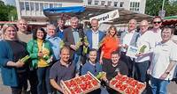Partystimmung auf dem Wochenmarkt: Ein Fest mit Erdbeeren, Spargel und rumänischen Spezialitäten