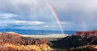 Free Rainbow Reflects Near Mountains Stock Photo