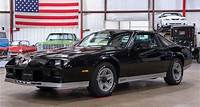 Step into the 1980s with this captivating 1982 Chevrolet Camaro Z28, a true embodiment of the era's