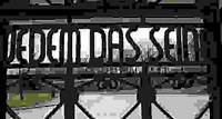 Sign with the phrase “Jedem das Seine” (“To each his own”) on what was the main gate of Buchenwald concentration camp, at the Buchenwald Memorial, near Weimar, Germany.