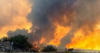 Air tankers and helicopters attack Arizona wildfire that has forced evacuations near Phoenix