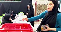 Iranians voting in a run-off presidential election