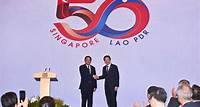 Singapore, Laos ink pacts on education, carbon credits