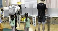 Voters in Tokyo cast ballots to decide whether to re-elect incumbent conservative as city's governor