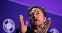 Tesla pushes back big robotaxi unveiling