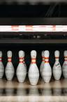 Free Close-Up Shot of White and Red Bowling Pins Stock Photo
