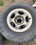 Rims n Tires off 1998 F150 4x4 Set of 4, centers included. Tires are worn..