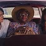 Connie Jackson, Margaret Qualley, and Geraldine Viswanathan in Drive-Away Dolls (2024)