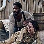 Corey Hawkins and Aisling Franciosi in The Last Voyage of the Demeter (2023)