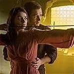Eve Hewson and Taron Egerton in Robin Hood (2018)