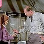 David Ogden Stiers and Kimiko Hiroshige in M*A*S*H (1972)