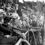 Graham McNamee of radio station WEAF broadcasting a baseball game from the 1924 World Series at Griffith Stadium, Washington, D.C.