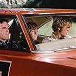 P.R. Paul, John Schneider, and Tom Wopat in The Dukes of Hazzard (1979)