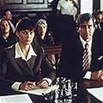 Carey Lowell and Sam Waterston in Law & Order (1990)
