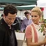 Ross McCall and Laura Ramsey in White Collar (2009)