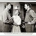 Robert Mitchum, John Rodney, and Teresa Wright in Pursued (1947)