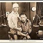 George Beranger and H.B. Warner in Stark Mad (1929)