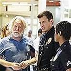 Timothy Busfield, Nathan Fillion, and Afton Williamson in The Rookie (2018)