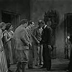 Boris Karloff, Charles Laughton, Gloria Stuart, Melvyn Douglas, Lilian Bond, Raymond Massey, and Eva Moore in The Old Dark House (1932)