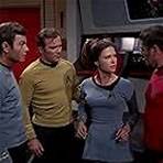 William Shatner, James Doohan, DeForest Kelley, and Jan Shutan in Star Trek (1966)