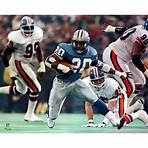 Unsigned Detroit Lions Barry Sanders Fanatics Authentic Blue Jersey Running Photograph