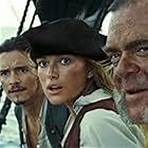 Orlando Bloom, Keira Knightley, and Kevin McNally in Pirates of the Caribbean: Dead Man's Chest (2006)
