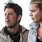 Rebecca Romijn and Christian Kane in The Librarians (2014)