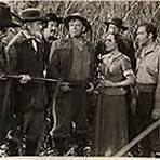 Wallace Beery, Dolores Del Río, and John Howard in The Man from Dakota (1940)