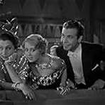 Joan Blondell, Aline MacMahon, and Dick Powell in Gold Diggers of 1933 (1933)
