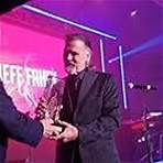 Jeff Fahey receives Humanitarian Award from William J MacDonald , 2022 Monaco Streaming Film Festival