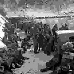 Men of the 5th and 7th regiments, U.S. 1st Marine Division, receiving an order to withdraw from their positions near the Chosin Reservoir, North Korea, November 29, 1950.
