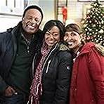 Tatyana Ali, Telma Hopkins, and William Allen Young in Christmas Hotel (2019)