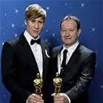 Oscar® Winners Dustin Lance Black (left) and Simon Beaufoy backstage during the live ABC Telecast of the 81st Annual Academy Awards® from the Kodak Theatre, in Hollywood, CA Sunday, February 22, 2009.