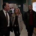 Ice-T, Robert Clohessy, and Kelli Giddish in Law & Order: Special Victims Unit (1999)