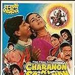 Shakti Kapoor, Mithun Chakraborty, Kader Khan, Raj Kiran, Shreeram Lagoo, Rameshwari, and Amrita Singh in Charanon Ki Saugandh (1988)