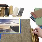 Deciding on a framing project with an assortment of colored matboard and frame samples